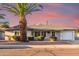 Charming single-story home featuring a desert landscaped yard and attached garage at 6838 E Almeria Rd, Scottsdale, AZ 85257