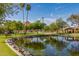 Beautiful park featuring a pond, mature trees, grassy lawns and a playground at 6838 E Almeria Rd, Scottsdale, AZ 85257