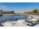 Scenic waterfront view featuring boats and city buildings, with a bridge in the distance at 6838 E Almeria Rd, Scottsdale, AZ 85257