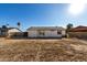 View of the house from the backyard showcasing a large yard at 7030 W Cypress St, Phoenix, AZ 85035