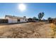 Backyard view of the property, showcasing a large, open area at 7030 W Cypress St, Phoenix, AZ 85035