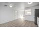 Dining area with tile floor and kitchen access at 7030 W Cypress St, Phoenix, AZ 85035