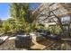 Community courtyard with seating, fire pit, and lush landscaping at 7161 E Rancho Vista Dr # 3002, Scottsdale, AZ 85251