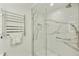 Spa-like shower with marble tile and glass enclosure at 7161 E Rancho Vista Dr # 3002, Scottsdale, AZ 85251