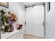 Hallway with barn door and decorative accents at 7206 W Wood St, Phoenix, AZ 85043