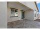 Covered patio with tile flooring and sliding glass door at 7206 W Wood St, Phoenix, AZ 85043