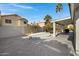 Landscaped backyard with a circular patio and herringbone-pattern flooring at 810 S Lagoon Dr, Gilbert, AZ 85233