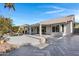 Spacious backyard with a herringbone patio and pool at 810 S Lagoon Dr, Gilbert, AZ 85233