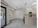 Modern kitchen with white shaker cabinets and a large island at 810 S Lagoon Dr, Gilbert, AZ 85233