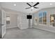 Home office with tile flooring, ceiling fan, and large windows at 810 S Lagoon Dr, Gilbert, AZ 85233