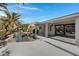 Modern backyard with a sleek pool and covered patio at 810 S Lagoon Dr, Gilbert, AZ 85233