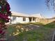 View of backyard showcasing grassy area and landscaping at 8623 W Athens St, Peoria, AZ 85382