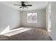 Bright and airy bedroom with carpeted flooring and ceiling fan at 8623 W Athens St, Peoria, AZ 85382