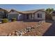 One-story house with a two-car garage and landscaped front yard at 8623 W Athens St, Peoria, AZ 85382