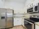 Bright kitchen with stainless steel appliances and granite countertops at 8623 W Athens St, Peoria, AZ 85382