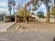 House with carport and large front yard at 1006 E Pasadena Ave, Phoenix, AZ 85014