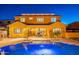 Luxury home with a large pool and outdoor patio area at 10110 W Redbird Rd, Peoria, AZ 85383