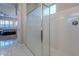 Modern bathroom with shower and a view of the bedroom at 10110 W Redbird Rd, Peoria, AZ 85383