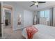 Comfortable bedroom with a queen-size bed, dresser, and large closet at 10110 W Redbird Rd, Peoria, AZ 85383