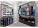 Walk-in closet with shelves, drawers, and hanging rods at 10110 W Redbird Rd, Peoria, AZ 85383