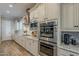 Spacious kitchen with stainless steel appliances and granite countertops at 10110 W Redbird Rd, Peoria, AZ 85383