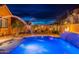 Inviting pool area with water features and fire pit at 10110 W Redbird Rd, Peoria, AZ 85383