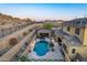 Resort-style pool with fire features and patio at 10110 W Redbird Rd, Peoria, AZ 85383