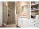 Bathroom with walk-in shower and white vanity at 102 W El Caminito Dr, Phoenix, AZ 85021