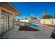 Inviting swimming pool with adjacent patio and backyard access at 102 W El Caminito Dr, Phoenix, AZ 85021