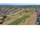 Aerial view of community near golf course and mountains at 10629 W Willow Creek Cir, Sun City, AZ 85373