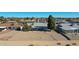 Aerial view of the home's backyard, showcasing a patio and desert landscaping at 10629 W Willow Creek Cir, Sun City, AZ 85373