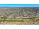 Wide aerial view of a community near a golf course at 10629 W Willow Creek Cir, Sun City, AZ 85373