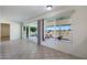 Bright dining area with sliding glass doors leading to a patio at 10629 W Willow Creek Cir, Sun City, AZ 85373