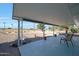 Covered patio overlooking golf course at 10629 W Willow Creek Cir, Sun City, AZ 85373