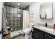 Modern bathroom with gray tile shower and granite vanity at 10902 W Flanagan St, Avondale, AZ 85323