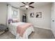 Cozy bedroom featuring a comfortable bed and plenty of natural light at 10902 W Flanagan St, Avondale, AZ 85323