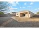 Large backyard with gravel and view of house exterior at 11225 E Marigold Ln, Florence, AZ 85132