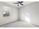 Bedroom with carpeted floor and ceiling fan at 11225 E Marigold Ln, Florence, AZ 85132