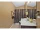 Clean bathroom with shower/tub combo and updated vanity at 1161 S Storment Ln, Gilbert, AZ 85296