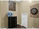 Bonus room with a dresser, dartboard, and additional storage at 1161 S Storment Ln, Gilbert, AZ 85296