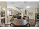 Upstairs game room with a wood table, seating, and a dartboard at 1161 S Storment Ln, Gilbert, AZ 85296