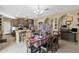 Well-equipped kitchen with granite countertops and wood cabinets at 1161 S Storment Ln, Gilbert, AZ 85296