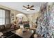 Open living room with a view into the dining area and kitchen at 1161 S Storment Ln, Gilbert, AZ 85296