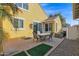 Outdoor patio with seating area and small lawn at 1161 S Storment Ln, Gilbert, AZ 85296