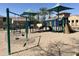 Well-equipped community playground with swings, slides, and shaded structures, perfect for recreation at 1161 S Storment Ln, Gilbert, AZ 85296