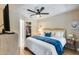 Bedroom with a ceiling fan and closet at 14300 W Bell Rd # 480, Surprise, AZ 85374