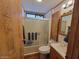 Clean bathroom with shower/tub combo and updated vanity at 1494 W Pawnee Ave, Apache Junction, AZ 85119