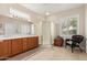 Double vanity bathroom with a large shower and plenty of storage at 15452 W Skyview Way, Surprise, AZ 85374