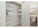 Well-organized linen closet with wire shelving at 15452 W Skyview Way, Surprise, AZ 85374