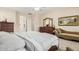 Bright main bedroom with king-size bed and plenty of natural light at 15452 W Skyview Way, Surprise, AZ 85374